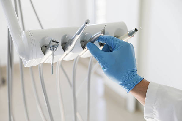 Professional Tooth Extraction technician working in Richland, MS